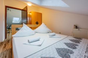 Posteľ alebo postele v izbe v ubytovaní Apartments ANITA