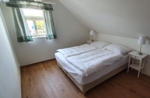 Postel nebo postele na pokoji v ubytování Apartmány Na Potoku