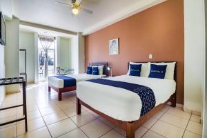 Postel nebo postele na pokoji v ubytování Hotel Plaza Galindo + 37 fotografií