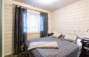 Postel nebo postele na pokoji v ubytování Ettomies II