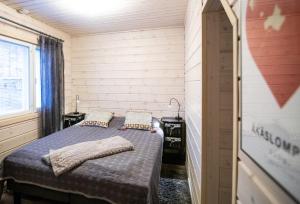 Postel nebo postele na pokoji v ubytování Ettomies II