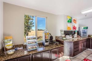 A kitchen or kitchenette at Quality Inn & Suites