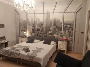 Postel nebo postele na pokoji v ubytování B&B La Corte Dei Samidagi