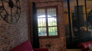 A seating area at B&B La Corte Dei Samidagi