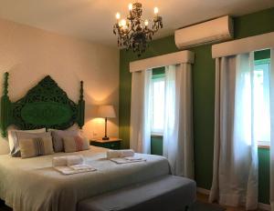 Uma cama ou camas num quarto em Villa Silene
