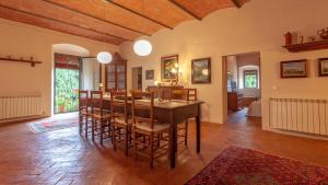 a dining room with a table and chairs at MAS CAMPS in Corçà