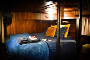 Posteľ alebo postele v izbe v ubytovaní La Cabine du Capitaine