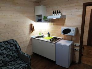 Кухня или мини-кухня в Dobryy Dom 71
