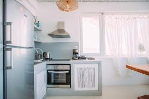 Foto dalla galleria di Mykonos Supreme Comfort Suites & Villas a Kalafatis Altre 151 foto