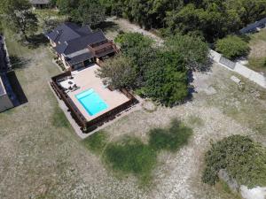 an aerial view of a house with a swimming pool at Sibiya Guest House in Sodwana Bay