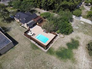 an overhead view of a house with a swimming pool at Sibiya Guest House in Sodwana Bay