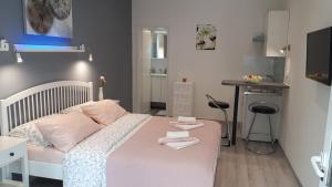 Postel nebo postele na pokoji v ubytování Guesthouse Mila