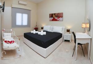 Posteľ alebo postele v izbe v ubytovaní Chrysiida Apartment