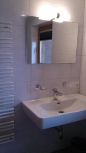 Kúpeľňa v ubytovaní Ferienhaus ANDREA
