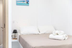 Posteľ alebo postele v izbe v ubytovaní Depis Luxury Suites