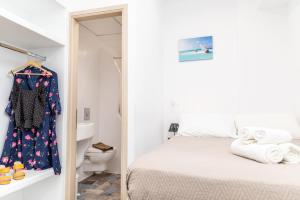 Postel nebo postele na pokoji v ubytování Depis Luxury Suites + 37 fotografií