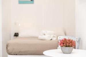 Posteľ alebo postele v izbe v ubytovaní Depis Luxury Suites