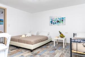Posteľ alebo postele v izbe v ubytovaní Depis Luxury Suites