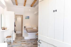 Posteľ alebo postele v izbe v ubytovaní Depis Luxury Suites