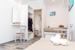 Posteľ alebo postele v izbe v ubytovaní Depis Luxury Suites