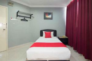 Postel nebo postele na pokoji v ubytování Puteri Ampang Hotel + 36 fotografií