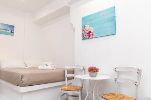 Posteľ alebo postele v izbe v ubytovaní Depis Luxury Suites