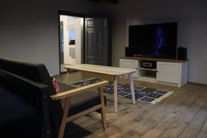 TV a/nebo společenská místnost v ubytování Levendula vendégház