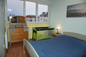 Postel nebo postele na pokoji v ubytování Apartament Słoneczny Wylotowa
