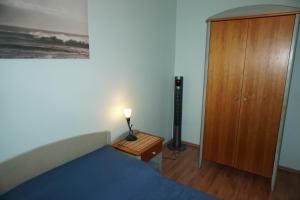 Postel nebo postele na pokoji v ubytování Apartament Słoneczny Wylotowa
