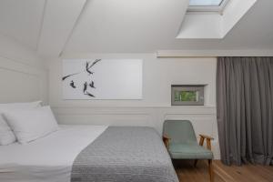 Ένα ή περισσότερα κρεβάτια σε δωμάτιο στο Hotel Peteani