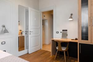 Ένα ή περισσότερα κρεβάτια σε δωμάτιο στο Hotel Peteani