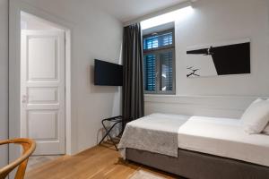 Μια τηλεόραση ή/και κέντρο ψυχαγωγίας στο Hotel Peteani