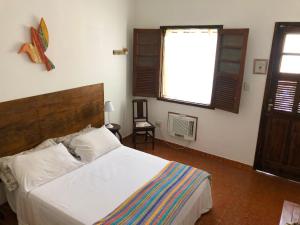 
Cama ou camas em um quarto em Cama&Café Solar dos Limoeiros
