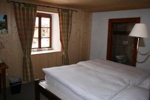 Postel nebo postele na pokoji v ubytování Hotel de la Sage