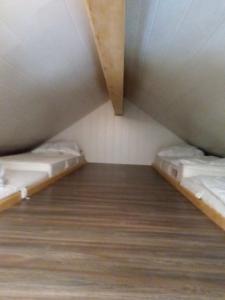 Posteľ alebo postele v izbe v ubytovaní Ferienhaus Alpengarten