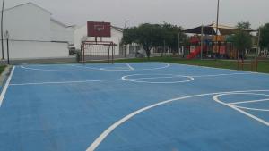 a basketball court with a basketball hoop on it at AIRPORT SHORT & LONG TERM EXPRESS ALMERIA x in Monterrey