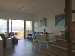Photo de la galerie de l'établissement Panoramic Apartment Poggettone Air conditioned, à Punta Ala