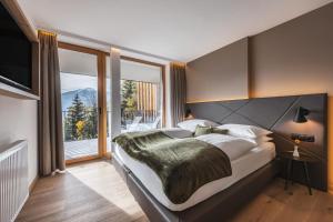 Postel nebo postele na pokoji v ubytování Maraias - Luxury Suites & Apartments + 37 fotografií