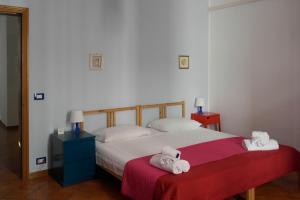 Postel nebo postele na pokoji v ubytování Casa Iolanda