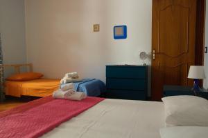 Postel nebo postele na pokoji v ubytování Casa Iolanda