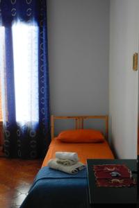 Postel nebo postele na pokoji v ubytování Casa Iolanda