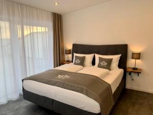 Postel nebo postele na pokoji v ubytování Hotel Sleep & Dream Nähe Europa Park und Rulantica