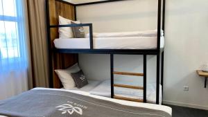 Postel nebo postele na pokoji v ubytování Hotel Sleep & Dream Nähe Europa Park und Rulantica