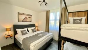 Postel nebo postele na pokoji v ubytování Hotel Sleep & Dream Nähe Europa Park und Rulantica