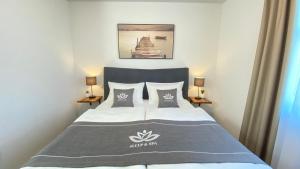 Postel nebo postele na pokoji v ubytování Hotel Sleep & Dream Nähe Europa Park und Rulantica
