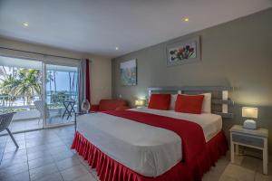 Postel nebo postele na pokoji v ubytování Costarena Beach Hotel