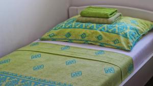 Postel nebo postele na pokoji v ubytování Guesthouse Esma