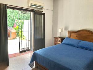 Ένα ή περισσότερα κρεβάτια σε δωμάτιο στο Córdoba Rent Apart