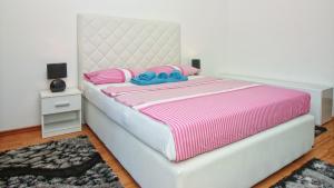 Postel nebo postele na pokoji v ubytování Guesthouse Esma