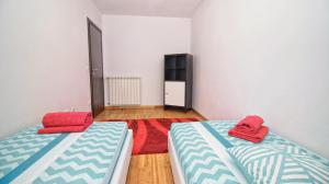 Postel nebo postele na pokoji v ubytování Guesthouse Esma